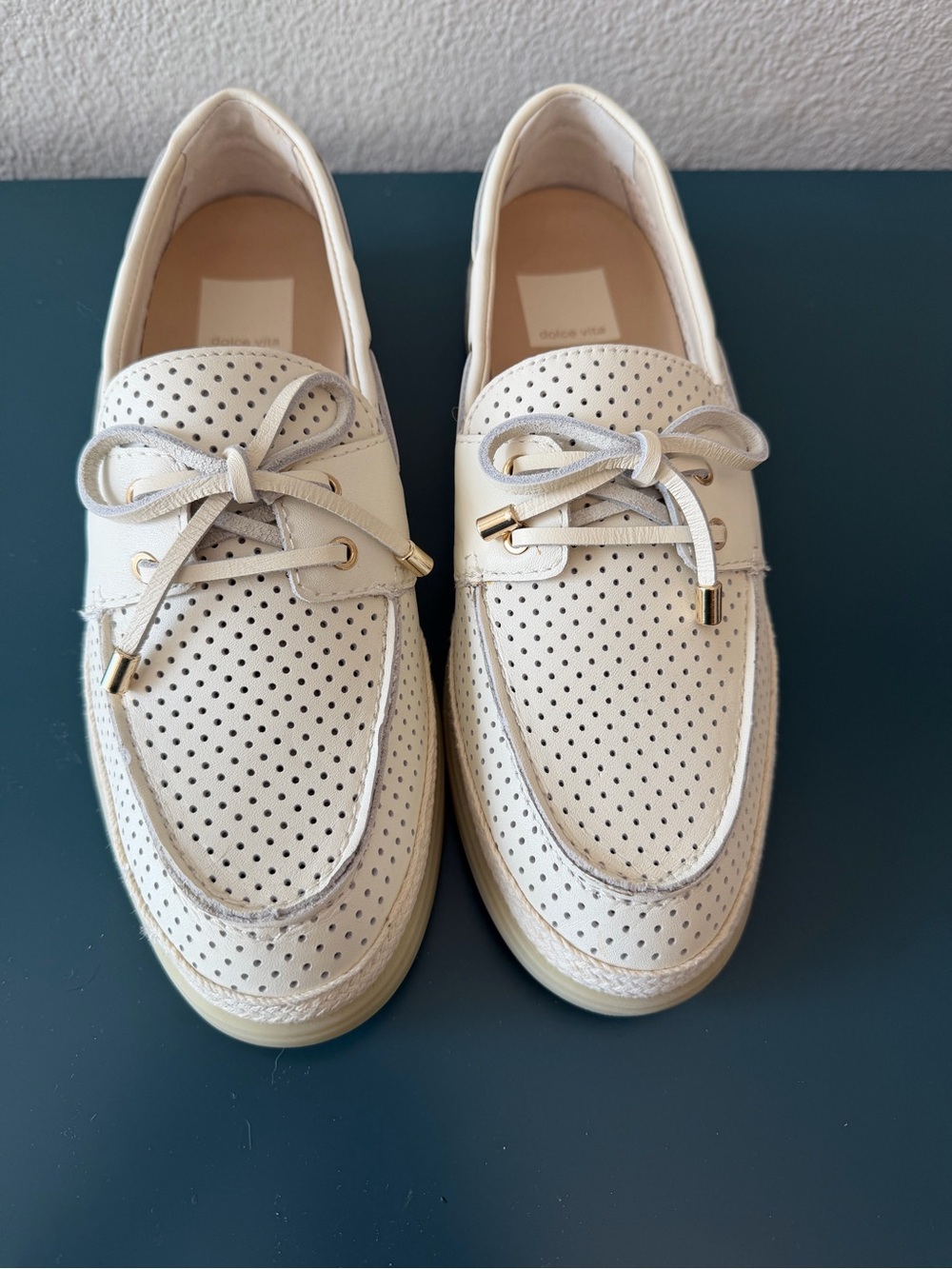 Dolce Vita Perforated Bow-Front Flats in Off-White with Gold Accents